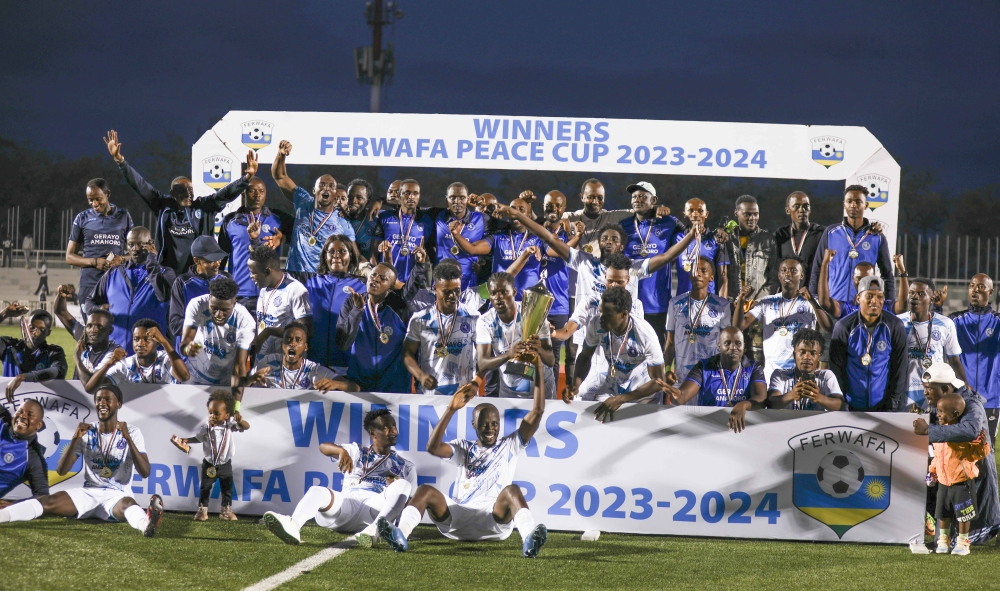 Police FC staff and players celebrate the victory to win the 2024 Peace Cup title at Kigali Pele Stadium on Wednesday, May 1. All Photos by Craish Bahizi Police FC staff and players celebrate the victory to win the 2024 Peace Cup title at Kigali Pele Stadium on Wednesday, May 1. All Photos by Craish Bahizi