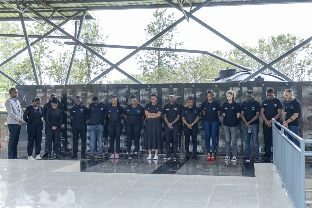 Management and staff of Winner Rwanda observe a moment of silence in honour of Genocide victims at the Ntarama memorial in
Bugesera District. Courtesy
