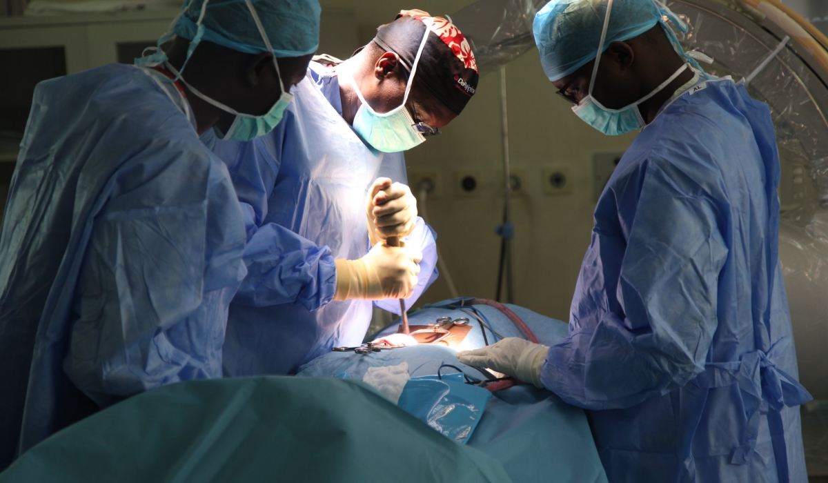 Doctors during an operation at King Faisal Hospital. Sam Ngendahimana