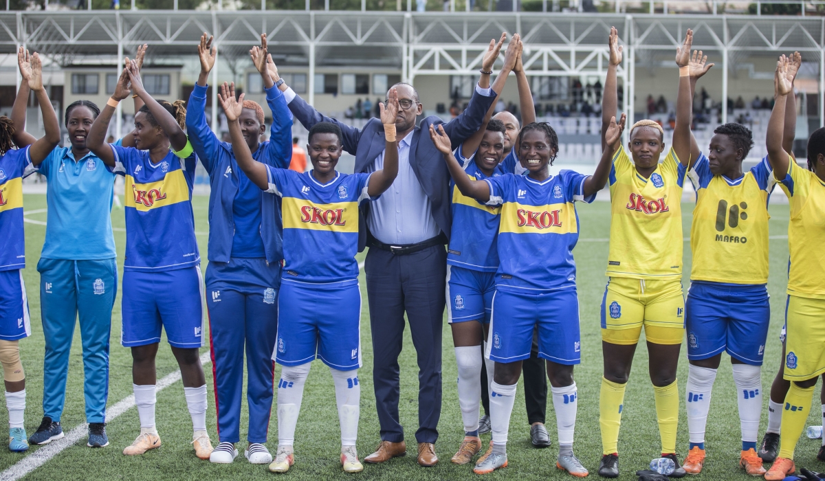  Rayon Sports WFC players and Team President celebrate the 4-0 win over  Indahangarwa WFC to win their first ever women’s Peace Cup trophy at Kigali Pele Stadium on Tuesday, April 30. Photos by Craish Bahizi.