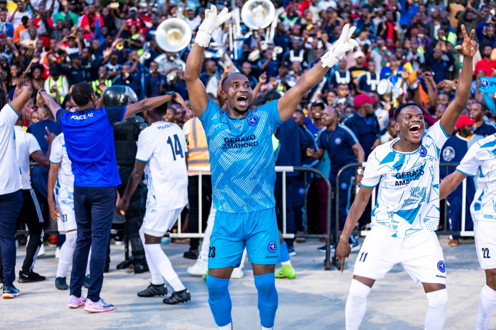 Police FC stopper and teammates warmly celebrate the crucial win over Bugesera to win the Peace Cup title