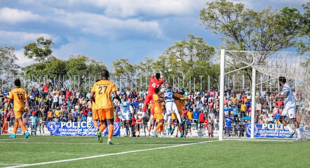 Bugesera FC goalkeeper in action trying to save his goalie during the match Bugesera FC goalkeeper in action trying to save his goalie during the match