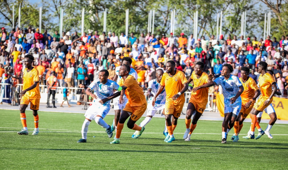 Bugesera players defending their goalie during the second half.
