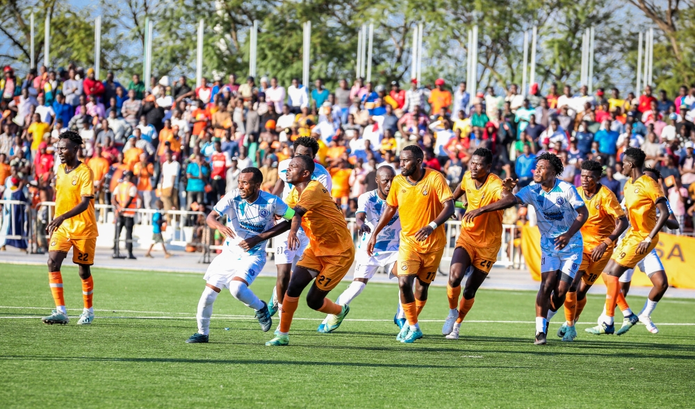 Bugesera players defending their goalie during the second half. Bugesera players defending their goalie during the second half.