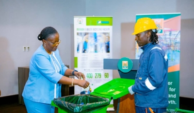 Minister of Environment, Jeanne d&#039;Arc Mujawamariya disposes plastic waste in a dustbin during the launch of a project to manage single use plastics in 2022. File photo 