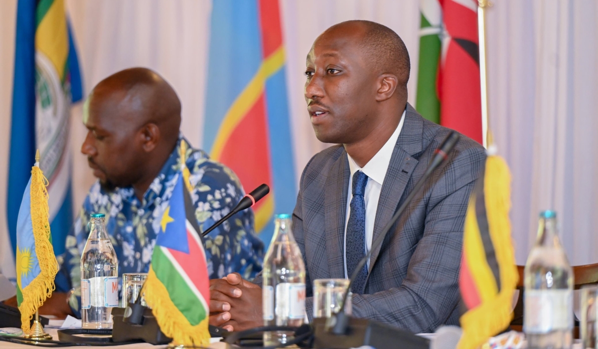 The Minister of Infrastructure, Jimmy Gasore, speaks during the signing ceremony as Kipchumba Murkomen, Kenya’s Cabinet Secretary for Roads and Transport takes notes. Courtesy