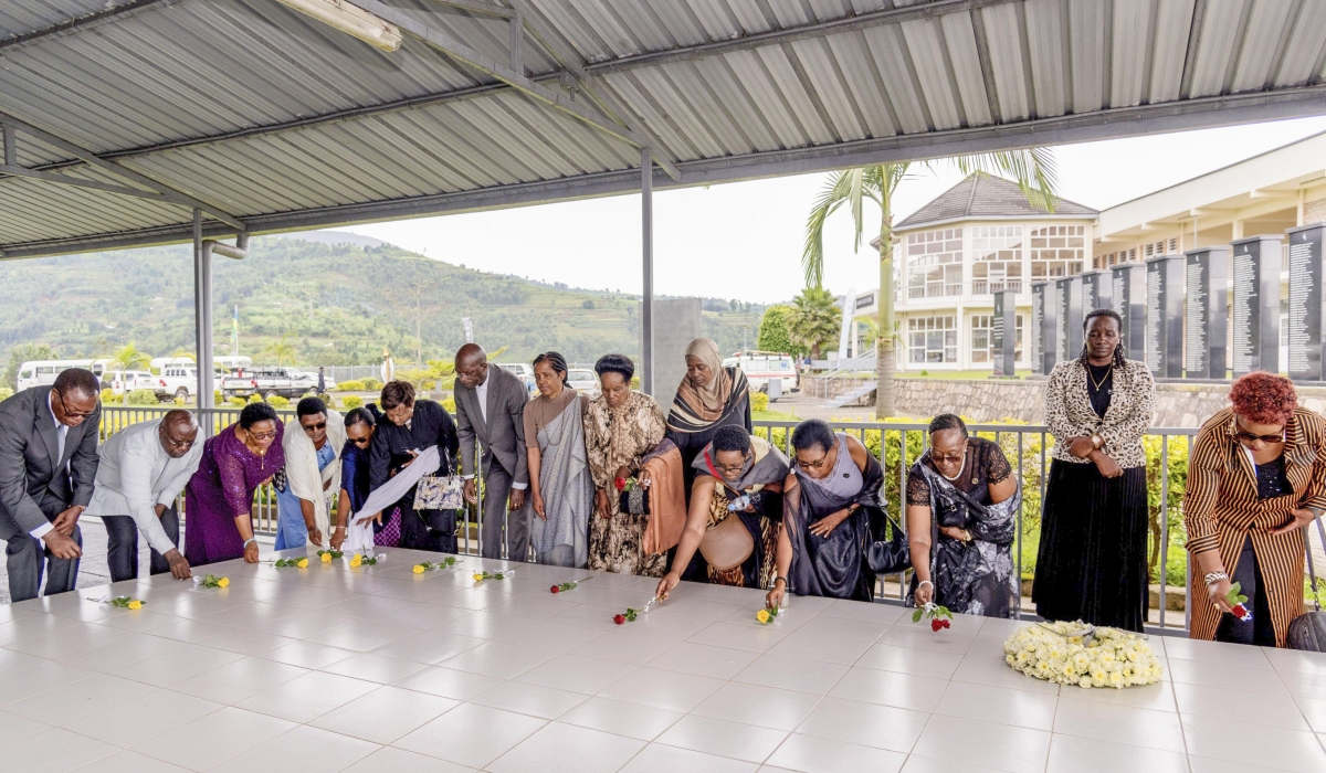 Members of Unity Club-Intwararumuri lay wreaths to pay tribute to over 50,000 victims of the 1994 Genocide against the Tutsi laid to rest at Murambi Genocide Memorial in Nyamagabe District, on Friday, May 3. Courtesy