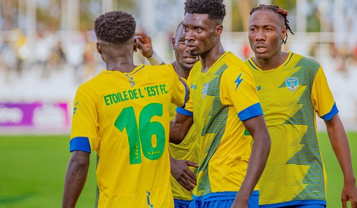 Etoile de l&#039;Est striker Sadick Sulley chats with teammates after scoring a goal on Saturday. Photo by Inyarwanda