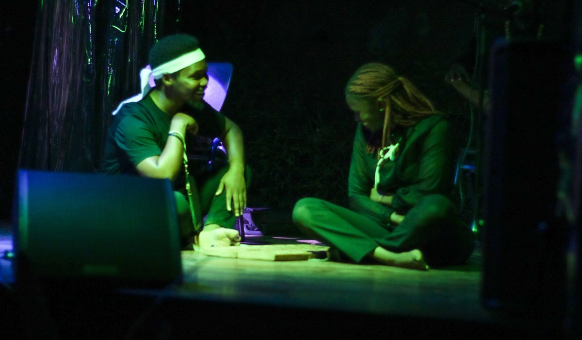 Poet Sylvester Nsengimana collaborates with poet Grace Uwizeye during the performance on Saturday