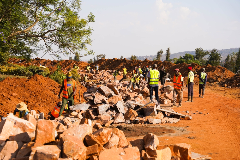 Workers on duty during Kigali Infrastructure Project (KIP) that consists of construction roads totaling more than 215 km, which was hindered by funding shortages.  Craish Bahizi