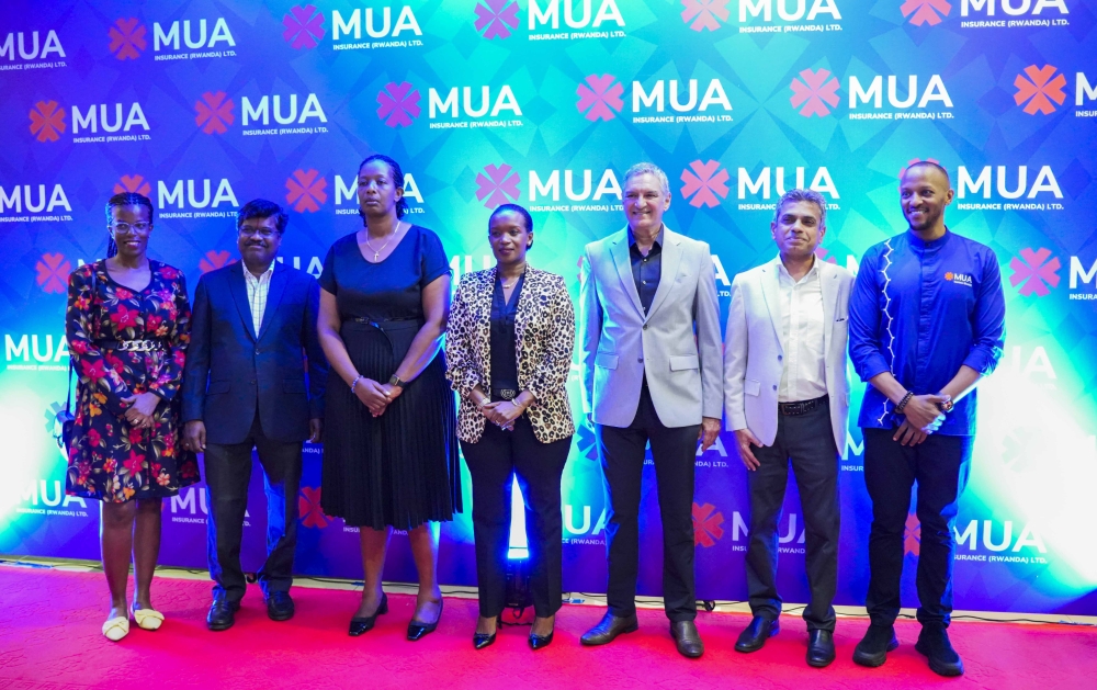 Officials pose for a group photo during the launch of the  customer experience hub on Friday, May 4. Courtesy