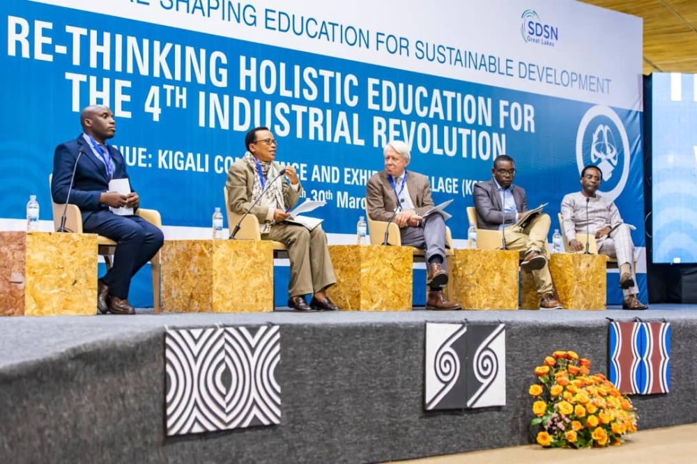 Rose Mukankomeje, the Director of Higher Education Council (2nd Left) speaks among panelists during the 1st International Conference on re-shaping education for Sustainable Development in Kigali on March 30,2023.