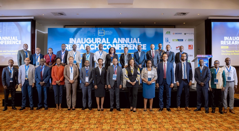 Delegates pose for a group photo during the inaugural Research Conference,in Kigali on May 9