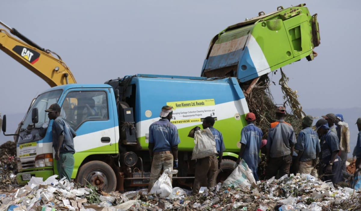 A truck offloads waste at Nduba landfill in Gasabo District. A plan has been devised to construct a new landfill adjacent to the current facility which officials say will help address challenges linked to the existing landfill. File.