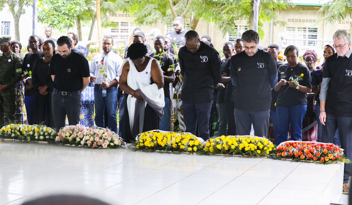 Management and staff of five companies involved in the construction of the proposed Bugesera airport observe a moment of silence in honour of the victims at the Gashora Genocide Memorial on May 8. All photos by Craish Bahizi