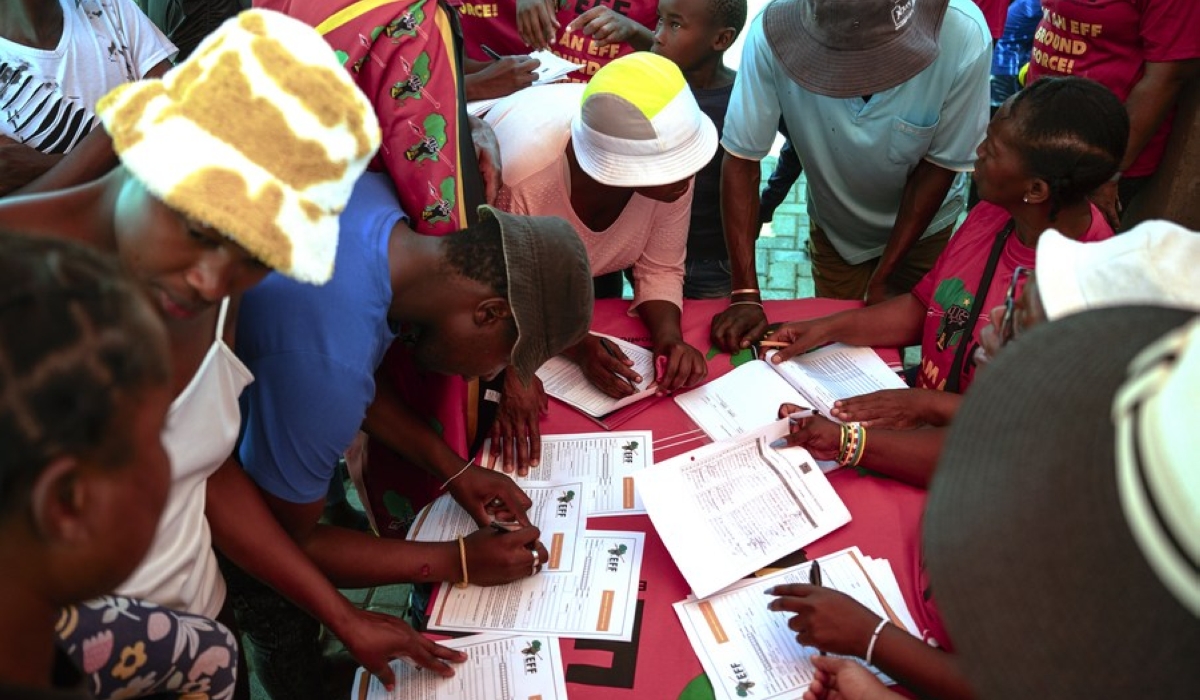 People register to vote at a voting station in Soweto, Johannesburg, South Africa, Nov. 18, 2023. (Photo by Ihsaan HaffejeeXinhua