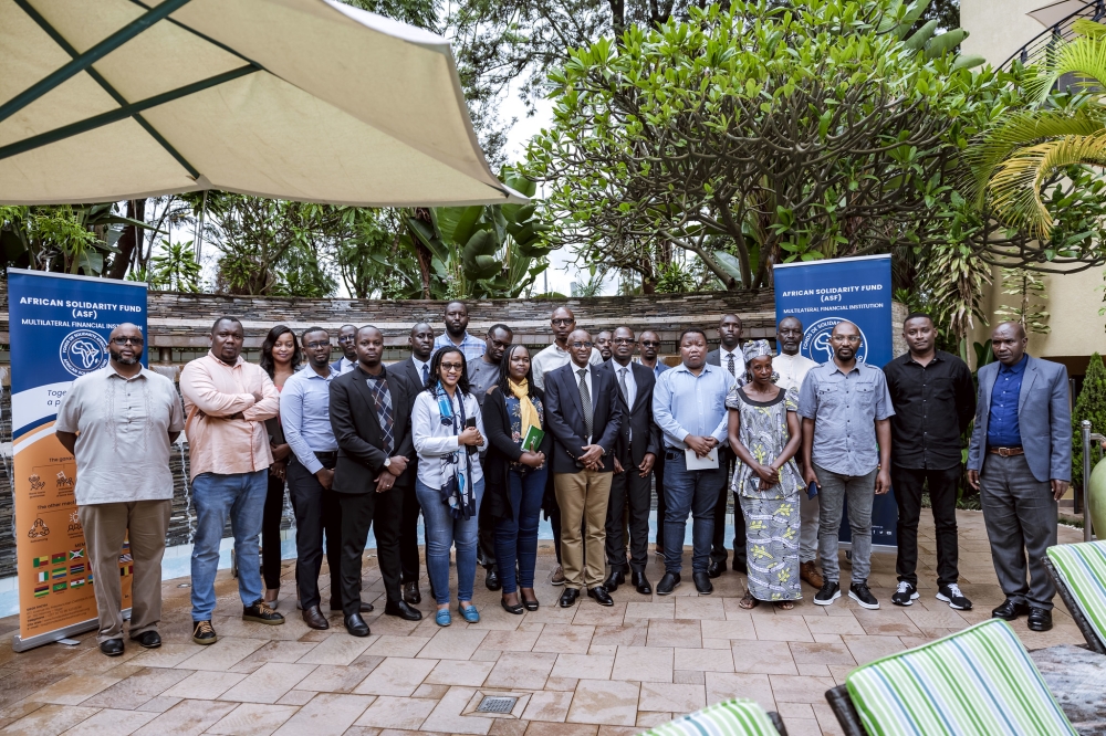 Delegates pose for a group photo after completing a breakfast meeting held in Kigali on May 9–10. Photos by Christianne Murengerantwari