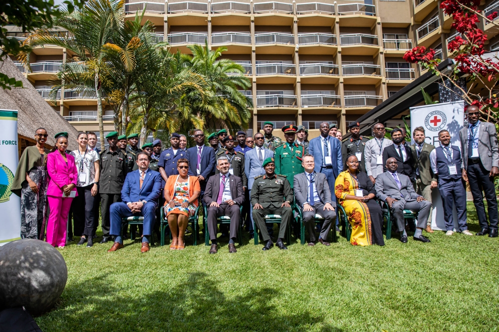 Delegates pose for a group photo after the opening session in Kigali on May 14. Dan Gatsinzi