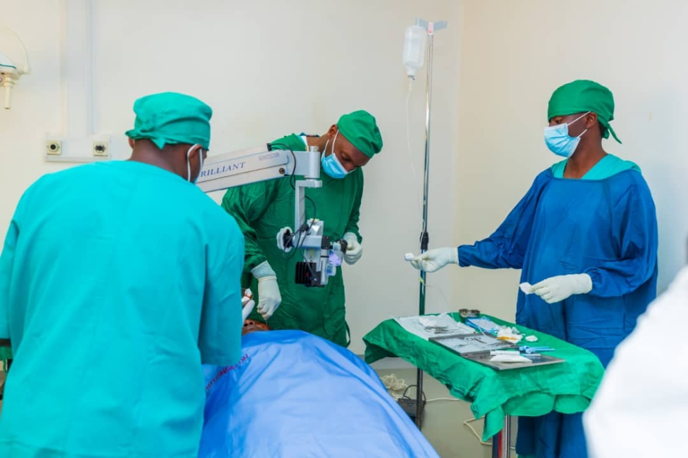 Rwanda Defence Force (RDF) and Ministry of Health medical personnel attend to a patient during the launch of the nationwide programme for treating patients with cataracts,  at Rutongo District Hospital in Rulindo District, on Thursday, May 16.