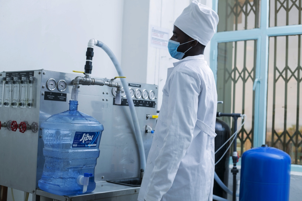 Jibu Rwanda worker filling drinking bottled water at Huye branch. The firm has been ranked among Africa&#039;s fastest rising companies in 2024 by Financial Times.  (Courtesy)
