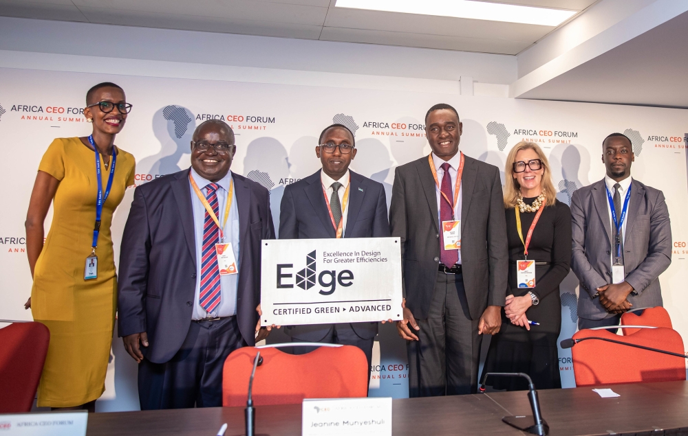 Benjamin Mutimura, CEO of I&M Bank Rwanda (c) holds the EDGE Advanced Certification during an event held on the sidelines of Africa CEO Forum in Kigali on May 16. All photos by Dan Gatsinzi