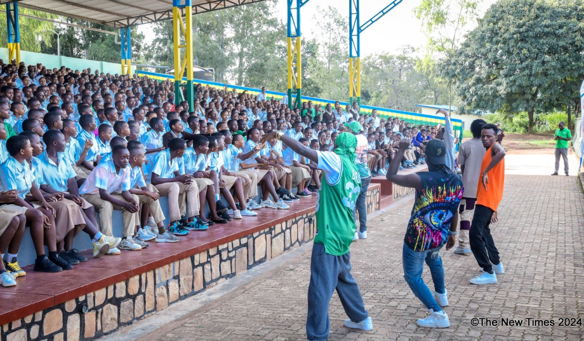 Local artiste Platini Nemeye  entertaining  participants who attended the compaign to raise awareness about drug abuse among youth at Kicukiro stadium. Photos by Craish Bahizi