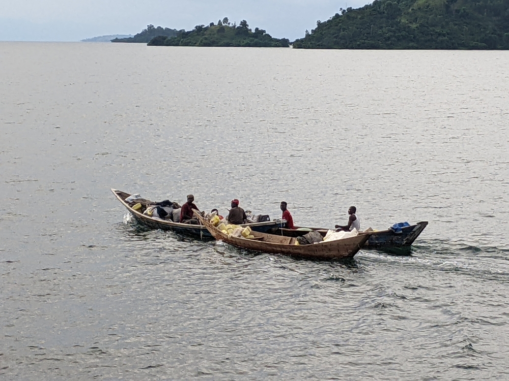 Wooden boats seen transporting people and merchandise in Karongi District