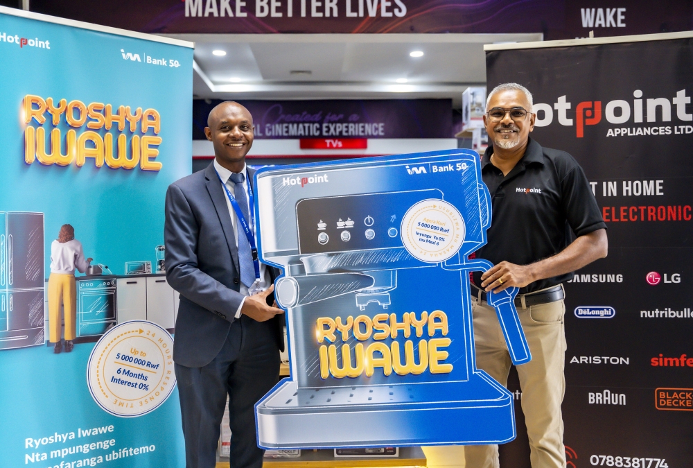 Norbert Mwanangu, General Manager of Retail and Digital Banking at I&M Bank Rwanda, and Manoj Akarah, CEO of Hotpoint, offficially launch Ryoshy