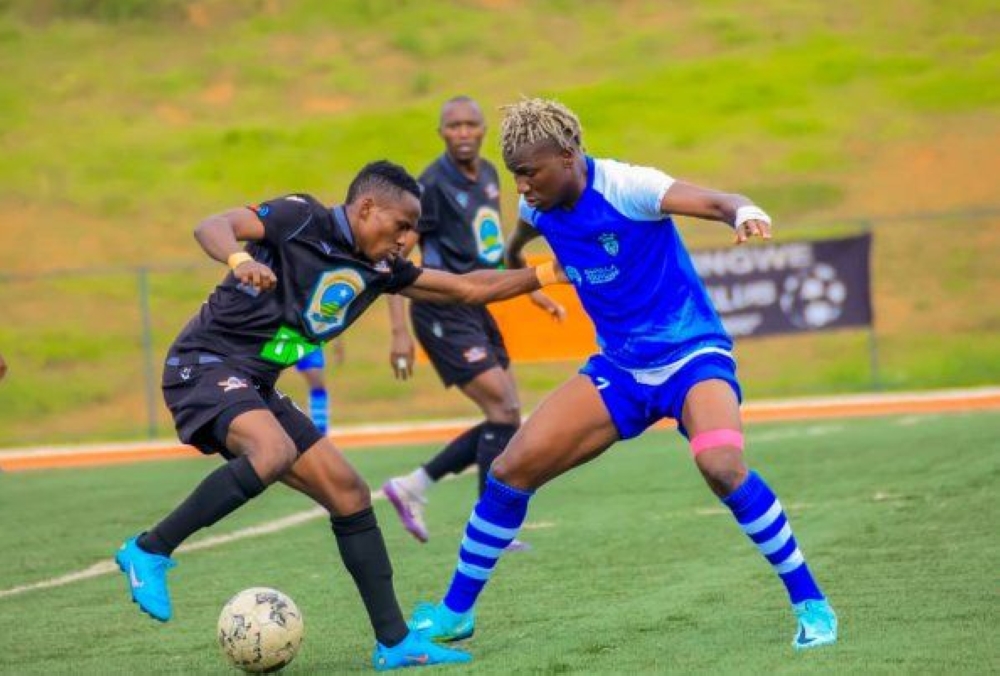 Adeaga fights for the ball during a game with Gasogi.