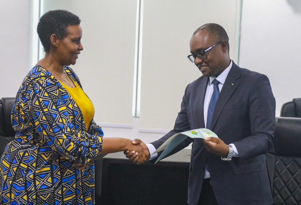 Social Democratic Party (PSD) Secretary-General Jean-Chrysostome Ngabitsinze submitting the list of his party’s candidates to National Electoral Commission (NEC) Chairperson Oda Gasinzigwa, on Monday, May 20. Photos by Craish Bahizi