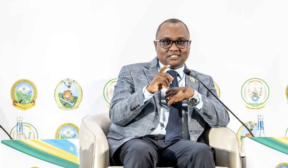 Minister of Trade and Industry, Jean Chrysostome Ngabitsinze speaks during the National Security Symposium on Friday, May 24. Courtesy