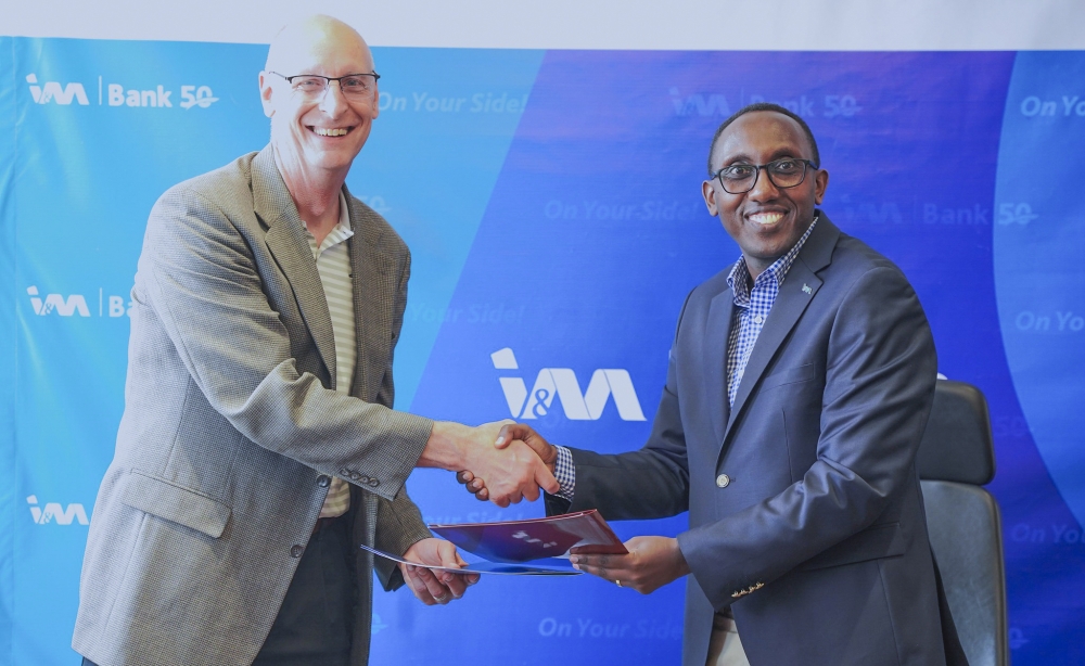 I&M Bank Chief Executive Officer Benjamin Mutimura, and Dr Jeffery Simmons, the Dean of the School at Oklahoma Christian University during the signing ceremony in Kigali on Friday, May 24. All photos by Craish Bahizi