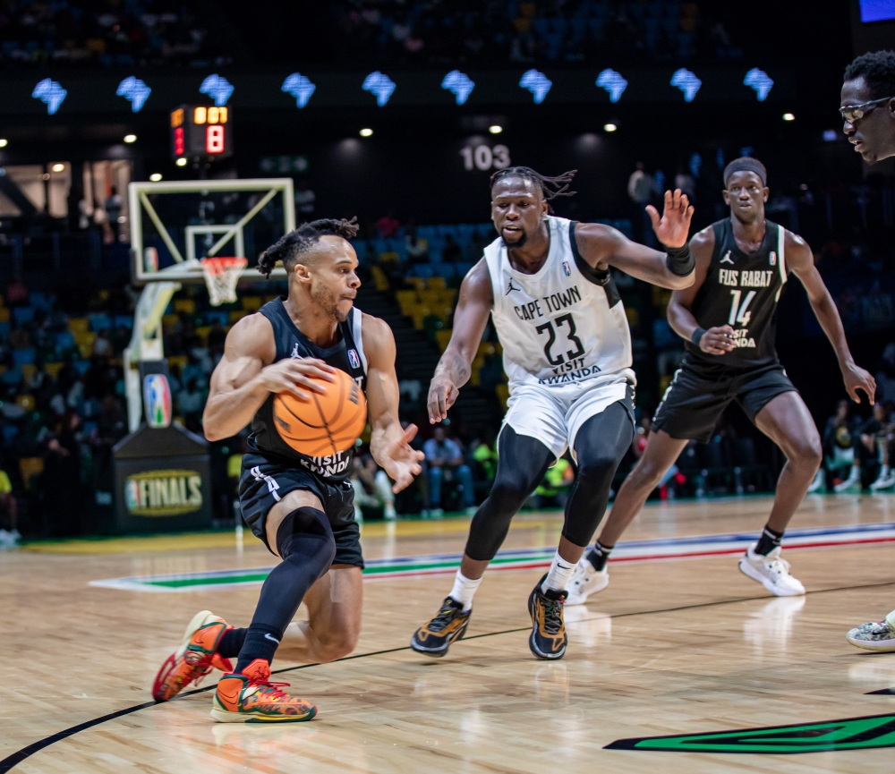 Tigers&#039; Samkelo Cele (C) tries to guard Rabat&#039;s John Jordan (L) during pair&#039;s quarterfinal crunch game on Sunday, May 26. Tigers prevailed with a 91-88 win that sent them through to the semifinals. All photos by Dan Gatsinzi