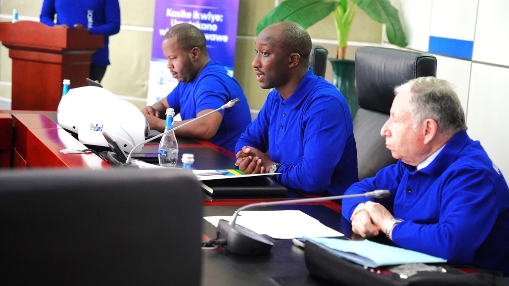 Minister of Infrastructure Jimmy Gasore addresses journalists during the handover of new helmets to Kigali City officials on Monday, May 27. Photos by Craish Bahizi