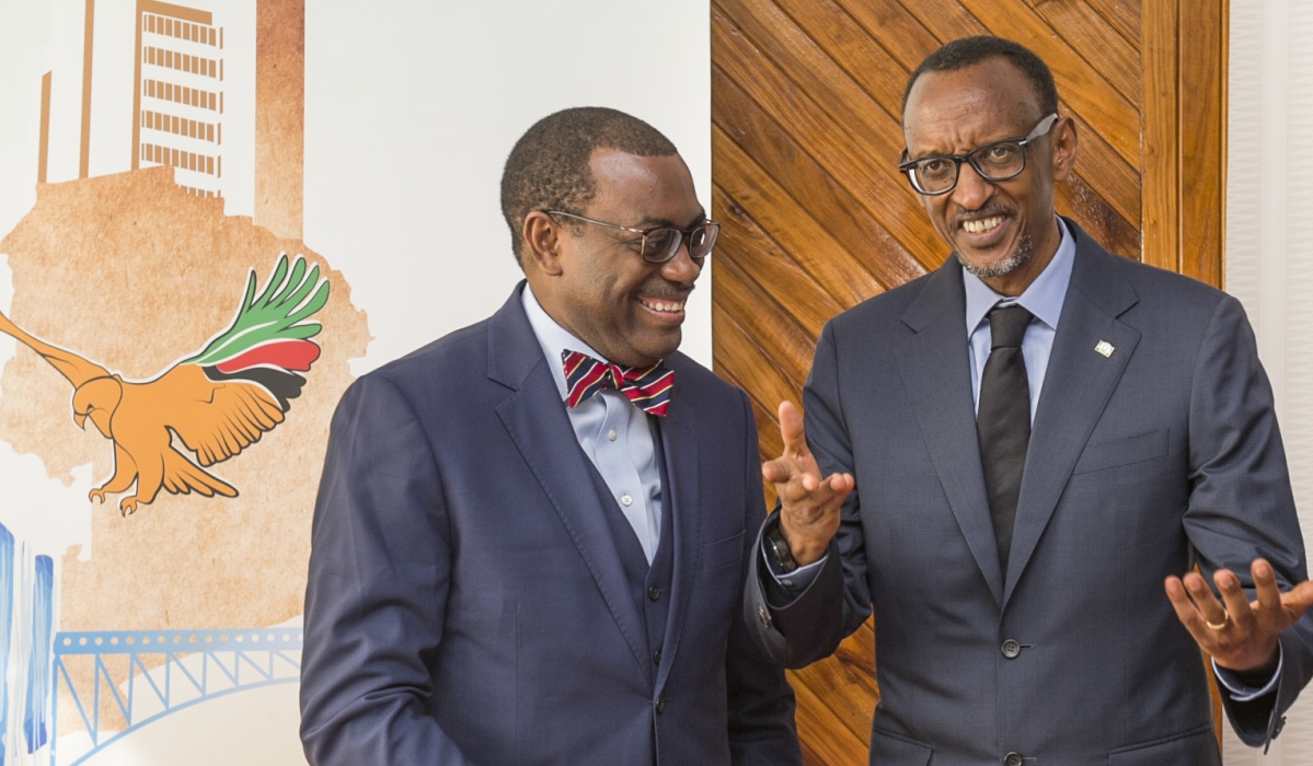 President Paul Kagame interacts with Akinwumi A. Adesina, President of the African Development Bank Group. Kagame is expected to attend the African Development Bank (AfDB) Annual Meeting, slated for May 27 to 31