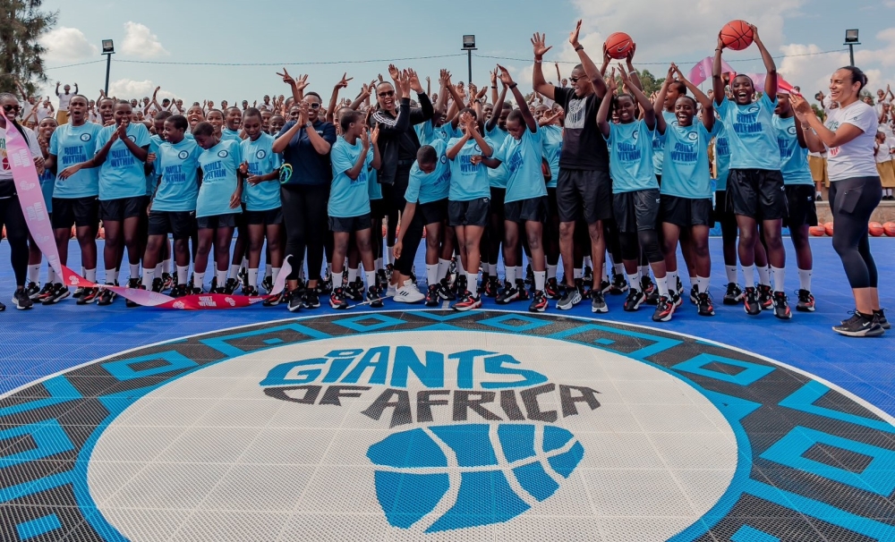 Officials and students at the newly  inaugurated basketball court at Ecole Notre Dame de la Providence (ENDP) in the Huye District on Tuesday, May 28. Courtesy