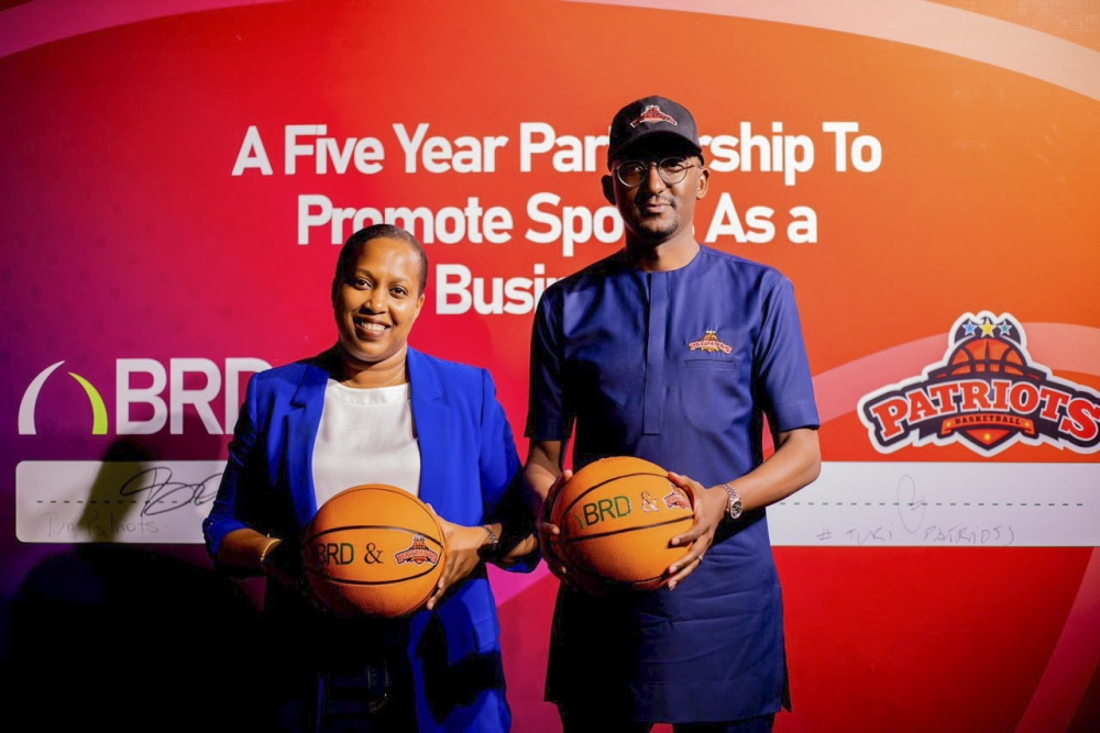 BRD Chief Executive Officer Kampeta Sayinzoga and Patriots chairman Clement Ndamage during the signing ceremony of the parternship in Kigali on May 28