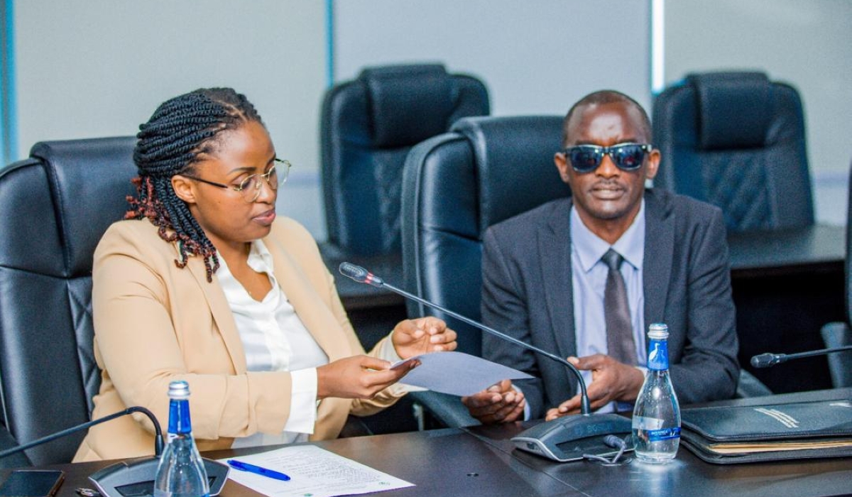 Fredrick Habamuremyi submits his candidacy ahead of the legislative polls to a NEC official, on Tuesday, May 28.