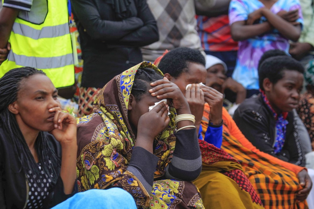 Mourners listen to Susan Nyiranyamibwa&#039;s song &#039; Ayiii ngire nte?&#039; during the commemoration event at Murambi Genocide Memorial in 2017. Photo by Sam Ngendahimana