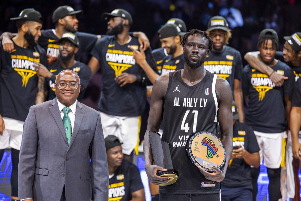 Al Ahly Ly center Jo-Lual Acuil Jr. (R) was named BAL 2024 MVP depsite his side losing 94-107 to Angola&#039;s Petro Atletico in the final-Olivier Mugwiza