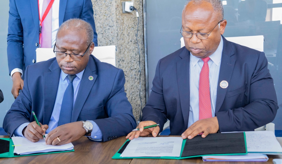 Finance Minister Uzziel Ndagijimana  and Alain Ebobissé Chief Executive Officer of Africa50, sign the agreement in Nairobi, Kenya on Friday, May 31. Courtesy