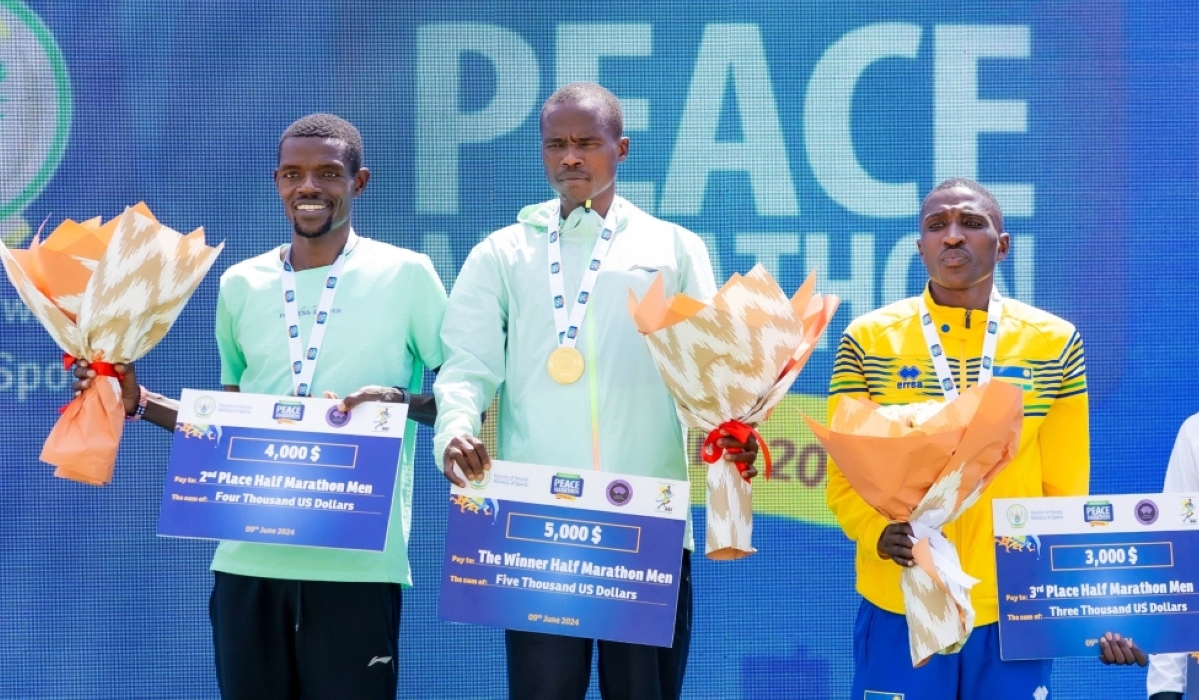 Rwanda’s Emmanuel Mutabazi (R) struck bronze medal in the men’s half marathon. The Police Athletics club runner believes Rwandans have what it takes to win big races of Kigali International Peace Marathon caliber-courtesy