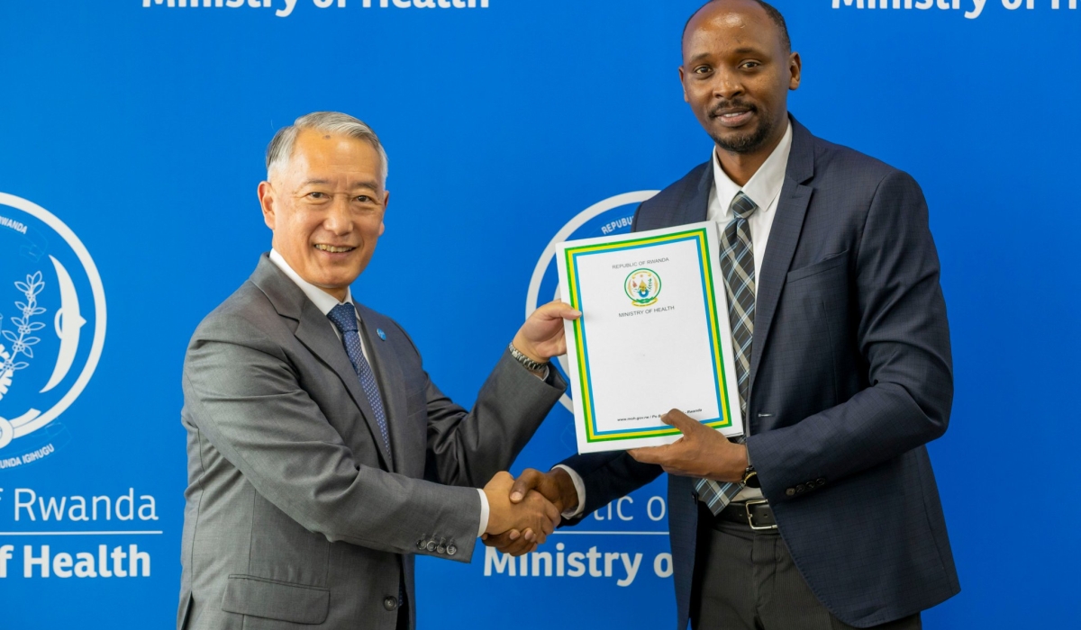 Rwandan Minister of Health Dr Sabin Nsanzimana and Dr Jerome H. Kim, the Director General of the International Vaccine Institute, after signing a Memorandum of Understanding (MoU) setting out the process for the establishment of the IVI African Regional Office in Rwanda, on Tuesday, June 11.