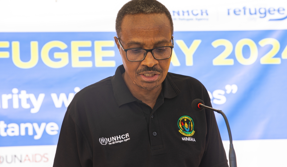 The Minister in Charge of Emergency Management , Maj. Gen (Rtd) Albert Murasira  addressing hundreds of people  at Mugombwa Refugee Camp, Gisagara District on Thursday, June 20