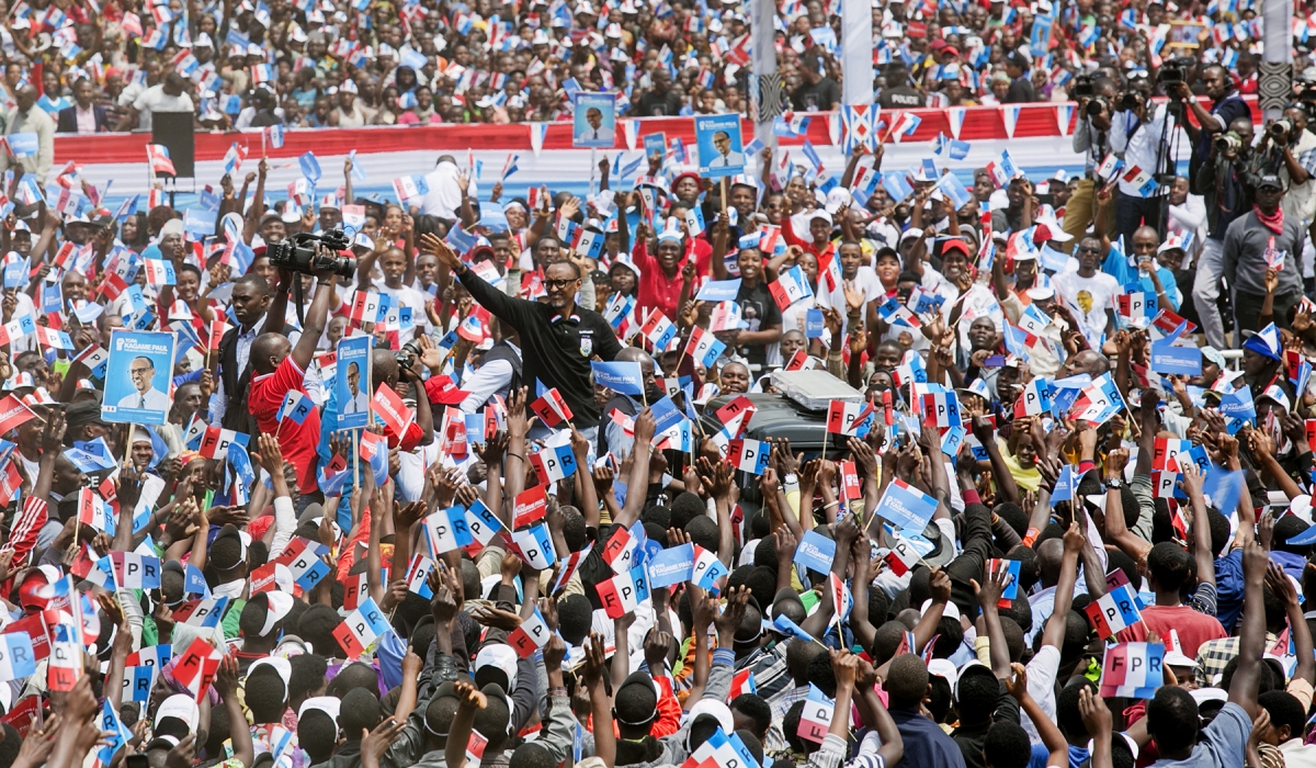 Kagame waves at a campaign rally in a previous election cycle.  File.