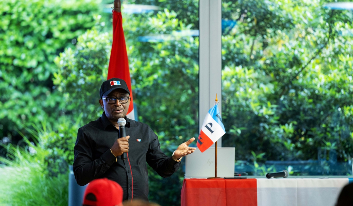 Dr. Richard Mihigo, Chairperson of the RPF in Switzerland addresses members  during the general assemby on Saturday, June 22. Courtesy