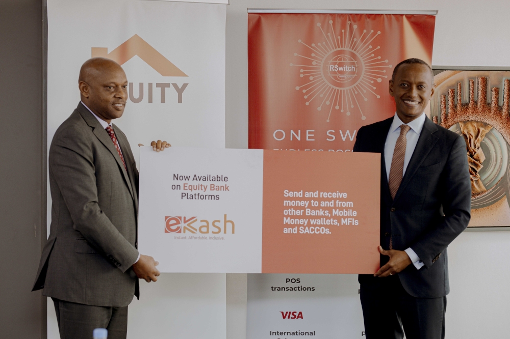 Hannington Namara, Managing Director of Equity Bank Rwanda, and Blaise Pascal Gasabira, Chief Executive Officer of RSwitch during the launch of eKash payments platform to broaden financial services for Equity Bank  on June 26