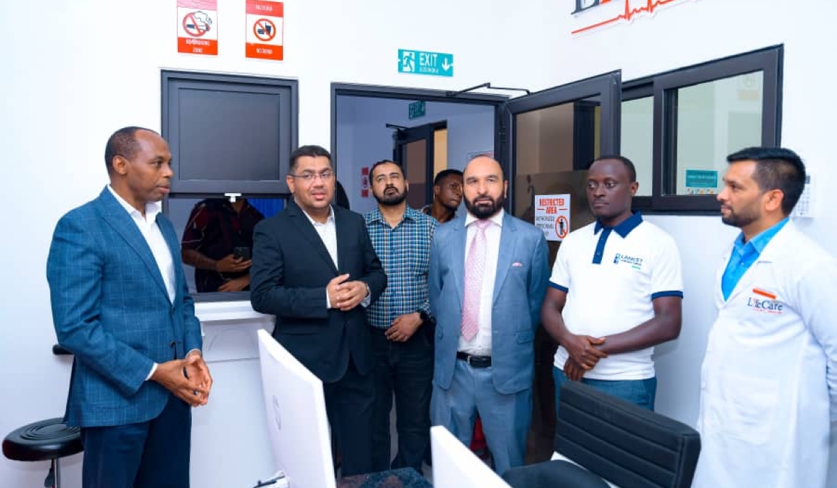 Officials touring a state-of-the-art healthcare facility following the successful launch of the partnership.