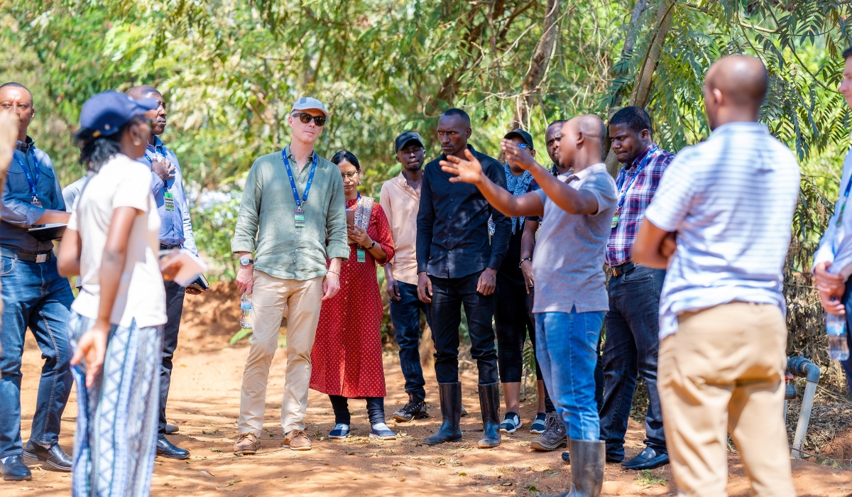 Participants during a guided tour. The  forum in Kigali that attracted stakeholders involved with an agricultural initiative