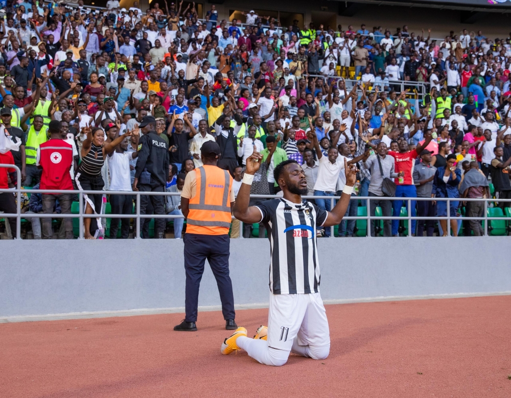 APR FC goal scorer Gilbert Mugisha celebrates his goal during a friendly match between 2023-24 Primus National League champions APR FC and Peace Cup winners Police FC.